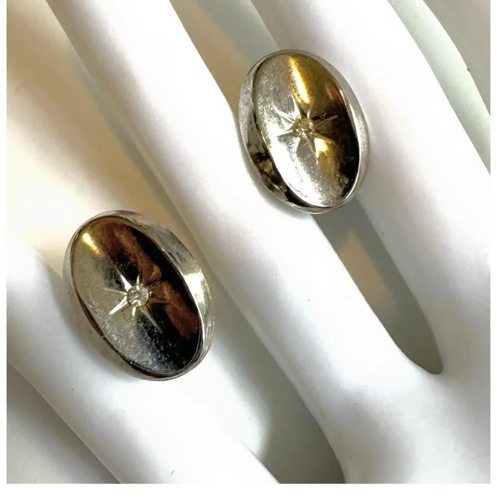 Silver tone oval cufflinks